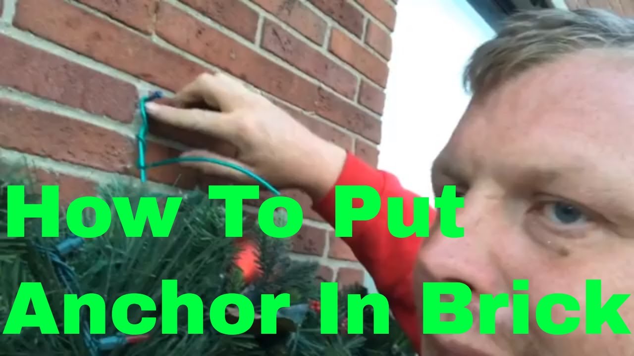 Installing a wreath on brick wall with hammer drill