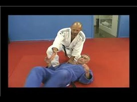 Judo Lessons for Beginners : How to Do a Top of Head Pin in Judo