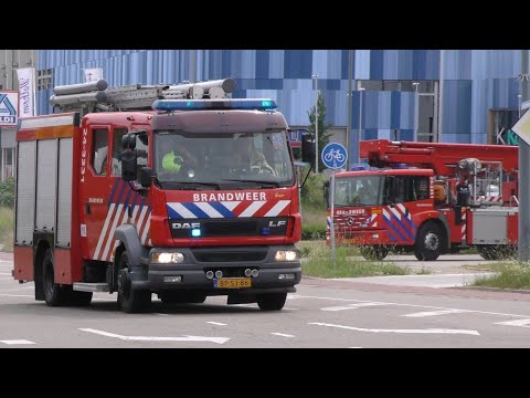 Brandweer Sittard-Middenweg, TS 24-3231 + HW 24-3351, naar woningbrand Kerkstraat Munstergeleen