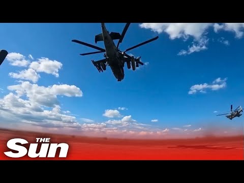 Russian helicopters fire at buildings and military vehicles in Ukraine