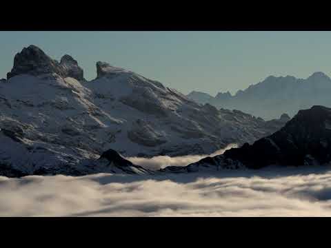 Mystic Alpine Peaks: A Breathtaking 4K Journey Through Snowy Mountains
