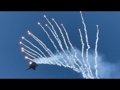 F-22 Raptor demonstration team popping flares-Cleveland Air show.