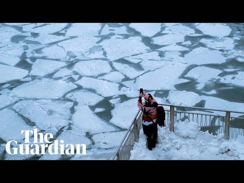 Polar vortex: -46C temperatures as Chicago River turns to ice