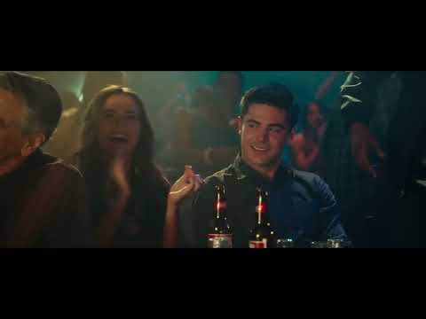 Trailer frame with nightclub lighting that matches the film’s EDM-forward palette