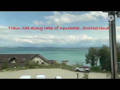 Train ride from Lausanne along Lake of Neuchatel in Switzerland