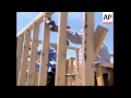 Bush visits volunteers working along hurricane-ravaged coast