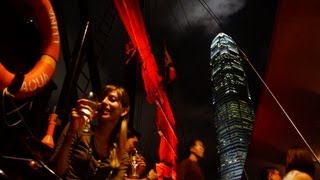Chinese Junk boat ride at night during a A Symphony of Lights light & laser show in Hong Kong China