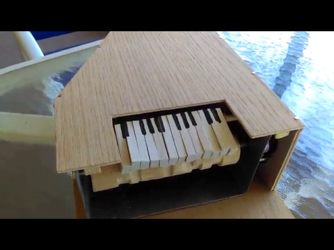Music box powered automata (hand made from scrap)