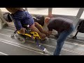 Securing A Motorized Or Electric Wheelchair To The School Bus Using The Blue Straps