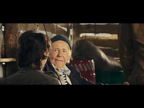 Diamond Cartel official trailer frame with Armand Assante and neon-noir palette, used here to illustrate the soundtrack tone