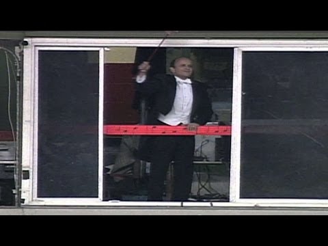 1993 NLCS Gm6: Fan swipes conductor's baton