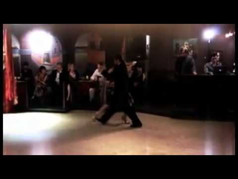  Adrian Costa  and  Amanda Costa  are  dancing  to  the  tango  "  Una Vez  "