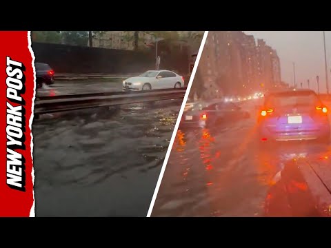 Heavy flooding hinders cars on the FDR Drive