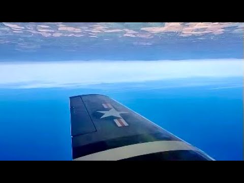 Stearman Biplane Rides  - Passenger enjoys rolls in the T-6 Texan