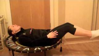 Ab crunch toning exercise on a mini trampoline
