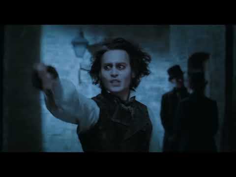 Sweeney Todd 2007 trailer still — the razor glints as Victorian London smokes behind Johnny Depp