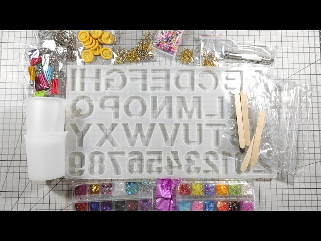 Vídeo relacionado con OSDUE Llavero de Letras, Llavero de Mariposa, Lindo Llavero con Colgante de Borla de Mariposa, Llavero de Lentejuelas de Amor, Iniciales, Llavero de Resina,Llavero de Nombre,Llavero de Mujeres y Niñas