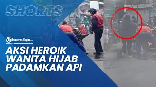Viral Video Aksi Heroik Wanita Berhijab Padamkan Api yang Melalap Motor di Bali