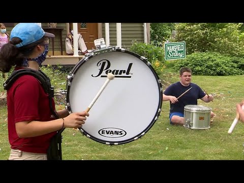 UMass drumline makes surprise visit to superfan in Mansfield