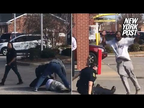 Onlookers help cop arrest violent suspect | New York Post