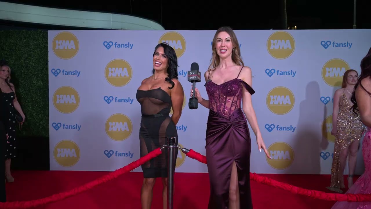 Ellie James interviews Eva at XMAAwardsLA on the red carpet