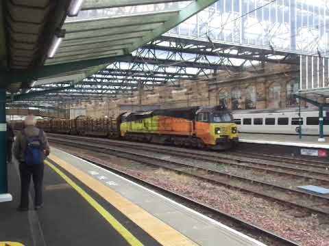 The Class 70 'GE PowerHaul' Colas Rail Freight No.70811 with Load of Logs was passing at Carlisle.