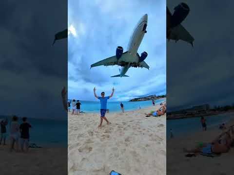 Crazy planes almost hit beach! Maho Beach in St Maarten!