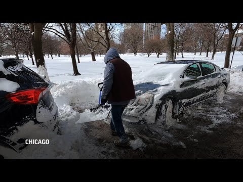 Winter storm buries Chicago in 16 inches of snow