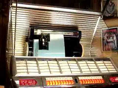 I thank you Mr Moon by Somethin Smith & the Redheads played on a 1954 Seeburg Jukebox