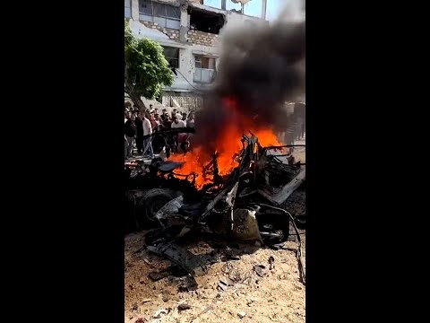 Car left burning by deadly Israeli airstrike in Gaza