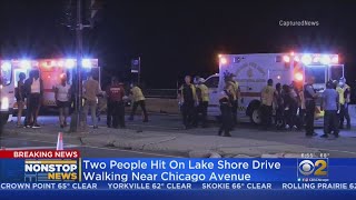 Two people were struck by a car while trying to cross Lake Shore Drive Thursday night.