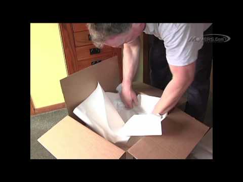 Part of a video titled How to Pack Clothing - YouTube