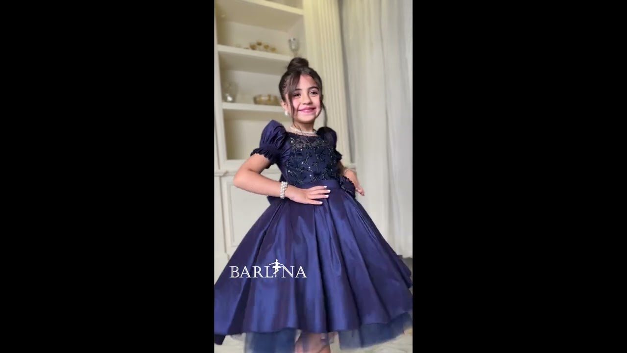 Girls' navy dress with luxurious embroidery on the chest - year 1