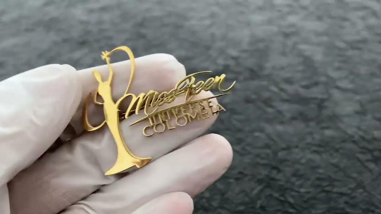 1563 - Stainless Steel Human Shaped And Lettered Brooch With Detachable Pins