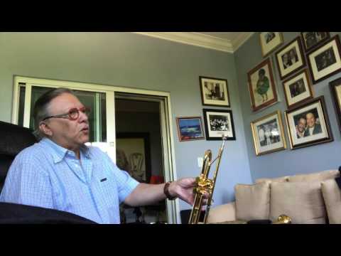 Arturo Sandoval taking delivery of his new horn.