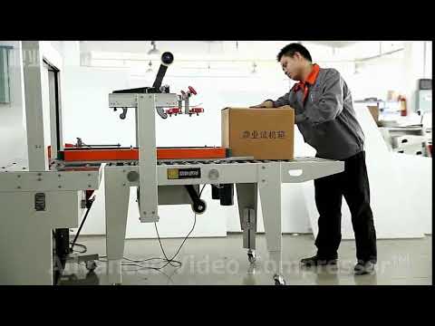 Automatic Box Strapping And Taping Machine