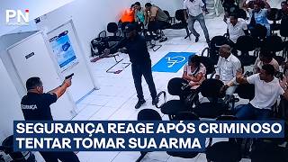 Um segurança de uma agência bancária reagiu após um criminoso tentar tomar sua arma