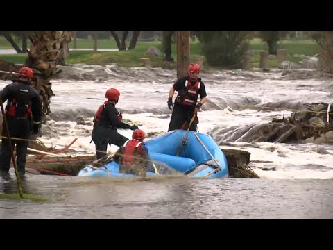 Numerous flood rescues were reported in areas east of Los Angeles as heavy rain pounded California on Thursday. The desert resort city of Palm Springs urged residents to stay where they were because of flooded streets. (Feb. 15)