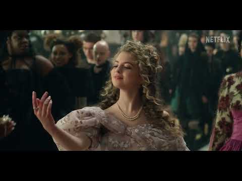 The School for Good and Evil official trailer frame — Sophie and Agatha swept into a fairytale campus as the score surges