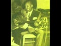 Sonny Boy Williamson plays guitar.Kind hearted woman.