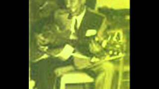 Sonny Boy Williamson plays guitar.Kind hearted woman.
