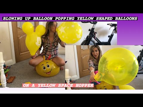 YELLOW BALLOONS AND A YELLOW SPACE HOPPER