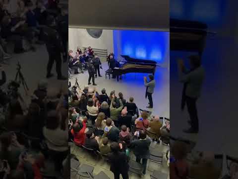 Police interrupting piano play by Alexey Lubimov