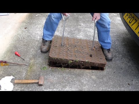 How to lift drain covers