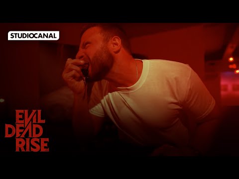 Man eating glass at Evil Dead Rise screening