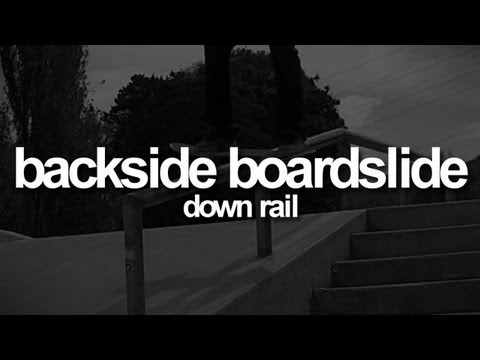 Backside Boardslide Down-Rail: First-Person Skateboarding.