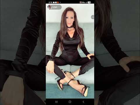 Pretty Tall Woman in Onesie and High Heels 