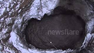 preview picture of video 'A huge hole in the ground on a flooded mine in Russia in the Urals city of Solikamsk - Part 2'