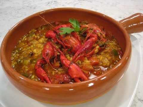 Arroz caldoso con cangrejos de río
