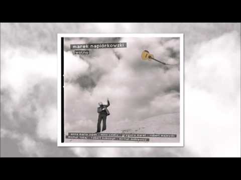 Marek Napiórkowski feat. Grégoire Maret – Between A Smile And A Tear